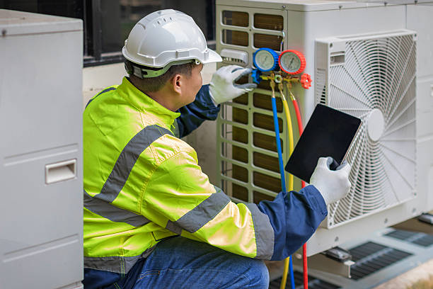Professional Air Conditioning Repair technician working in Elmwood Park, NJ